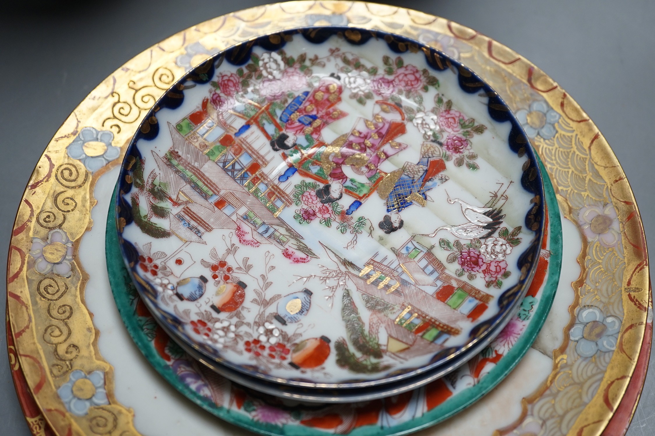 A mixed group of Japanese cloisonné enamel vases and porcelain vases and plates